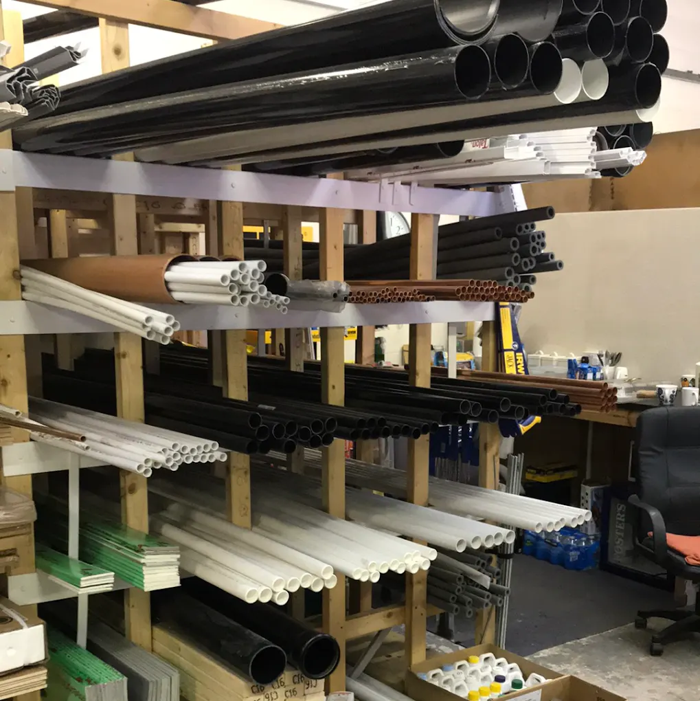 Racks of plumbing pipe and conduit stock at BBS Ltd